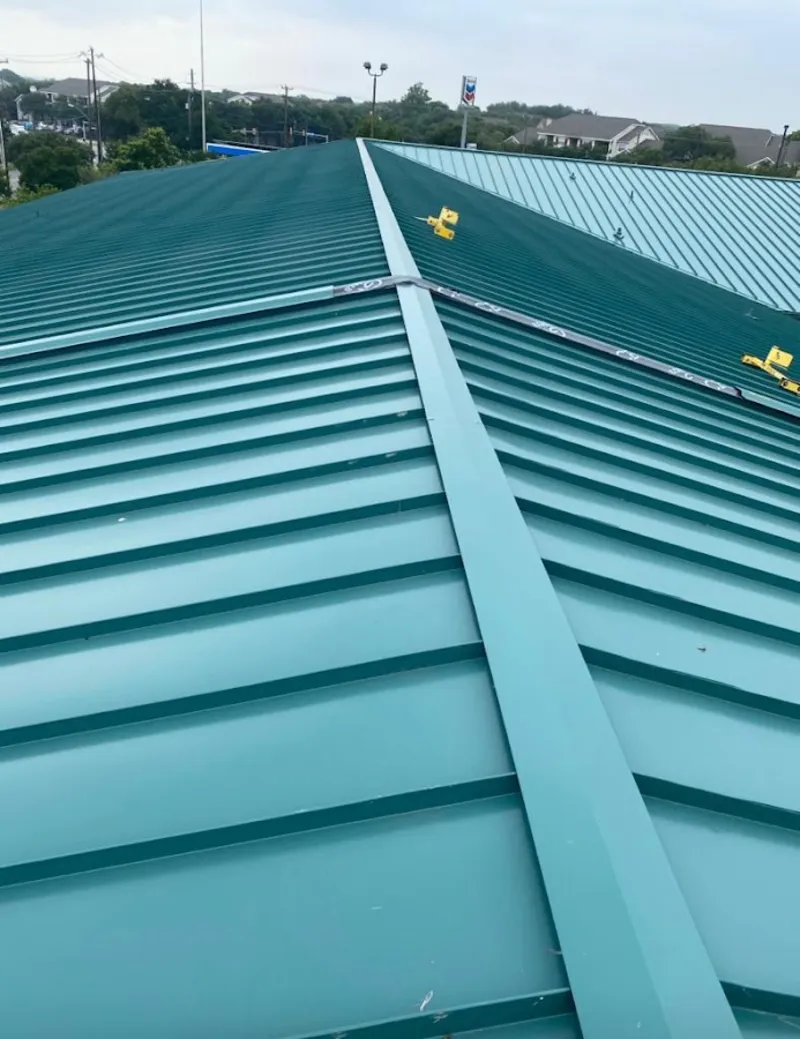 Green commercial metal roof ridge and valley for Metal Roof Repair in Robinson